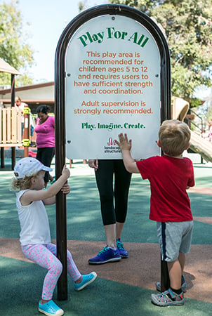 Sign reading "Play for All" 