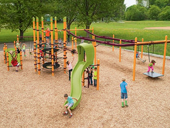 Overhead view of playground with zipline, net climber and green slide