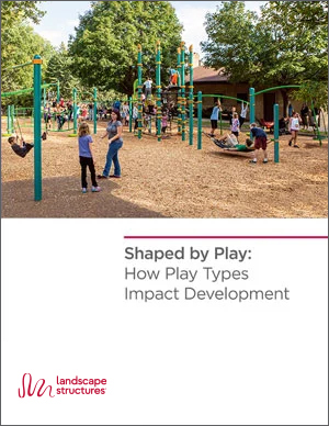 Cover of a document showing an image of a busy playground at the top and the title of the whitepaper and logo at the bottom