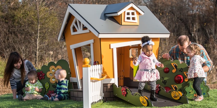 Toddlers playing on the SmartPlay Nook. 