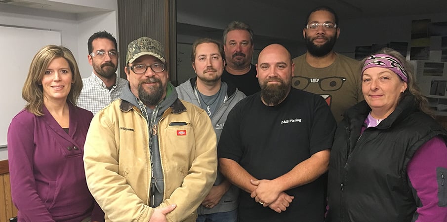 Landscape Structures employees pose for a group photo.